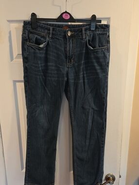 Tommy Bahama Men's Straight Jeans in Dark Blue Denim. Authentic Fit.